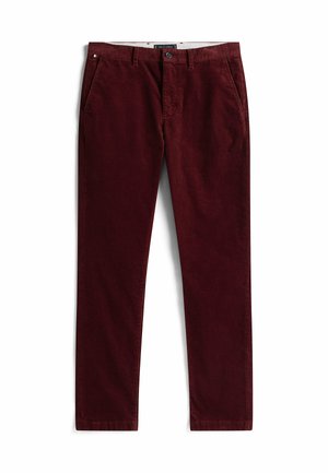 Burgundychromfarbene Cordhosen mit geradem Schnitt, ausgestattet mit zwei Seitentaschen, einem Knopfverschluss und einem Markenetikett am Bund. Weiche Textur.