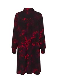 Czarna i czerwona sukienka w kwiatowy wzór z kołnierzykiem, długimi rękawami, elastycznymi mankietami i lekko rozkloszowanym dołem. Gładka faktura materiału.