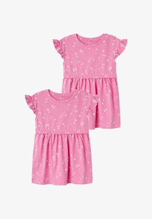 Two pink children's dresses with short ruffle sleeves, featuring a floral pattern in white, made from soft cotton fabric.
