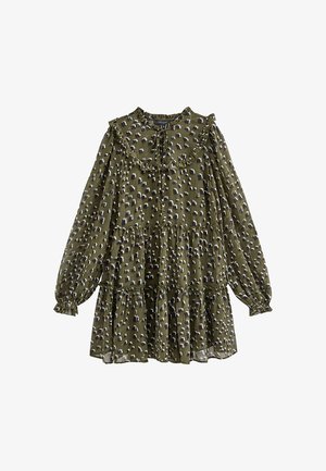 Robe verte à motif avec col à volants, manches longues bouffantes, design à volants superposés et lien à nouer au cou. Tissu doux et léger.