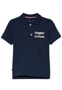 Námořnická polo košile vyrobená z bavlny, s klasickým límečkem, dvěma knoflíky a bílým logem "TOMMY HILFIGER" na přední straně. Krátké rukávy.