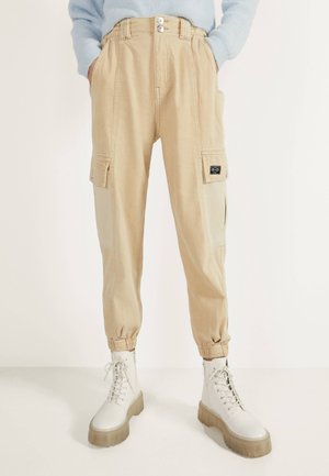 Trousers - beige