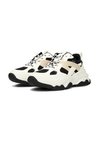 Chunky Sneakers im Farbschema Weiß, Schwarz und Beige. Hergestellt aus synthetischen Materialien, mit Netzpaneelen und dicken Sohlen.
