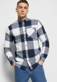 Jack & Jones check shirt in red and navy | ASOS