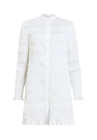 Robe chemise blanche avec un col, ornée de rayures texturées, de fermetures à boutons et de manches et ourlet à volants.