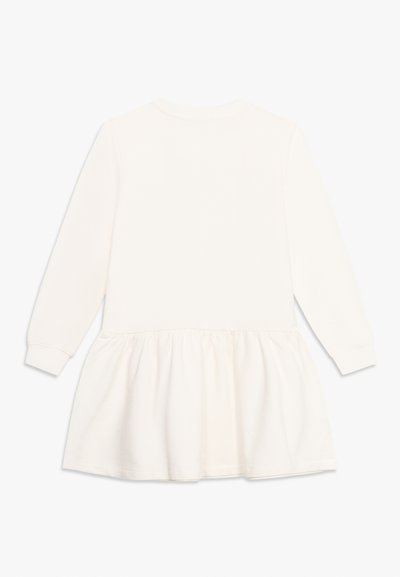 Robe couleur crème à manches longues avec une jupe froncée et des poignets côtelés, vue de dos sur un fond blanc uni.