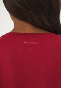 ONLY Play ONPAUBREE LIFE ON BAT LOOSE - Sportska majica - sun-dried tomato