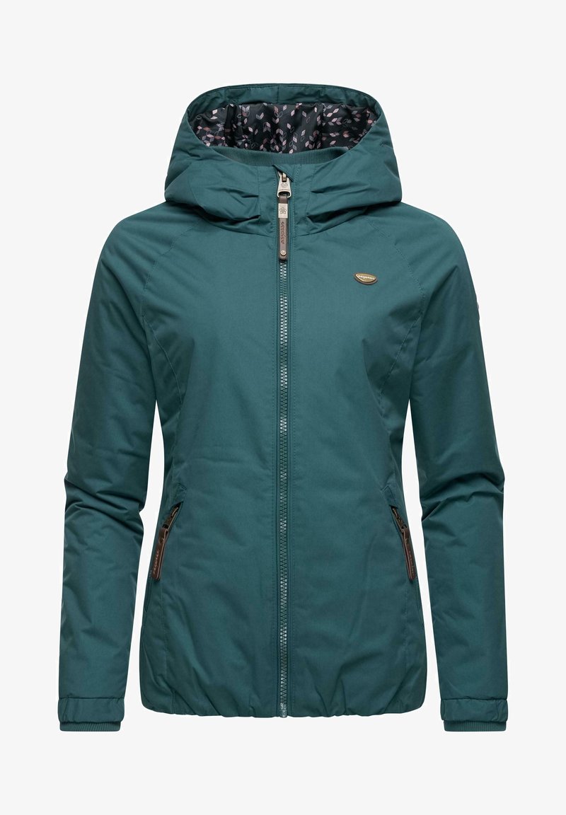 Tirkizna sintetička jakna s kapuljačom, prednjim zatvaračem, dva bočna džepa, elastičnim manžetama i uzorkom u unutrašnjosti. Mekani materijal.