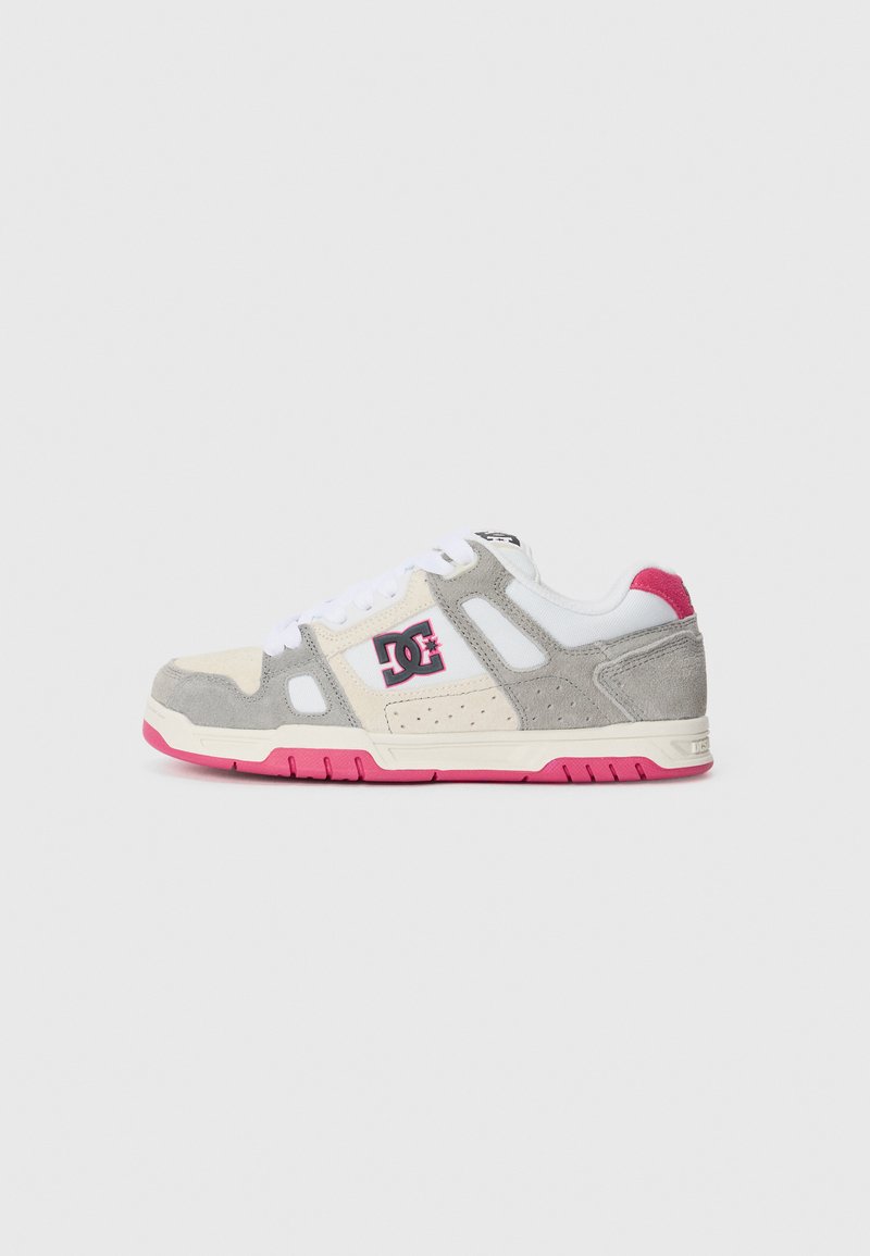 Sneaker with a gray suede and off-white mesh upper, pink accents, white laces, and logo detailing on the side. Rubber sole.