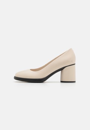 SCULPTED - Pumps - limestone