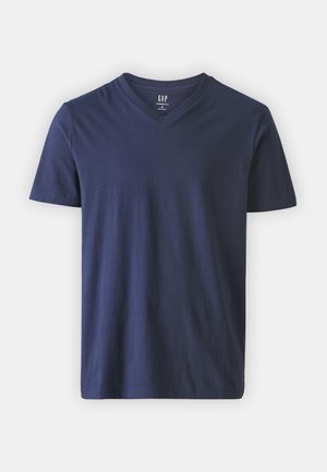 Marineblauwe katoenen t-shirt met een V-hals ontwerp, korte mouwen en een rechte zoom. Heeft een gladde textuur en een minimalistische stijl.