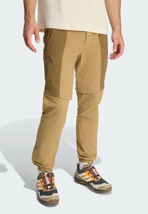 - Długie spodnie trekkingowe