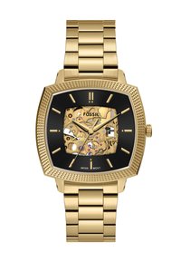 Montre Fossil carrée avec un bracelet en acier inoxydable doré, un cadran noir et des mécanismes exposés ornés d'accents dorés et roses.