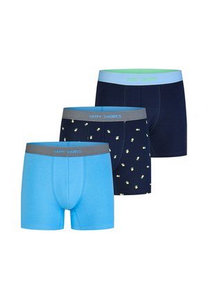 Drei Paare Herrenboxershorts in einfarbig hellblau, marineblau mit kleinen gelben Mustern und einfarbig marineblau, jeweils mit markierten Bundbändern.