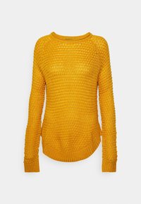 Maglione giallo lavorato a maglia con un motivo testurizzato, scollatura rotonda e maniche lunghe. Polsini e orlo a costine. Presenta una vestibilità comoda.