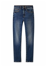 Jeans i mörkblå denim med en urtvättad finish. Funktioner inkluderar fem fickor, knappstängning och kontrasterande sömmar längs sömmarna.