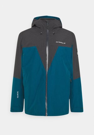 Veste imperméable bleue et gris foncé avec capuche, fermeture éclair devant et partie supérieure texturée, étiquetée Jack Wolfskin et TEXAPORE sur la manche.