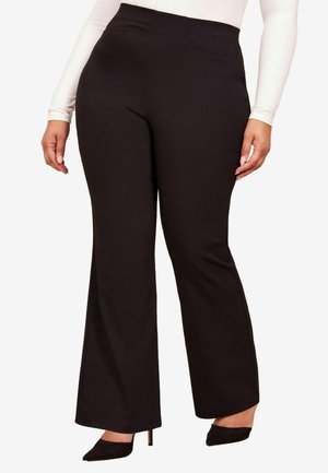 Black flared pants with a smooth texture, high waist, and subtle front seams, paired with black high-heeled shoes.