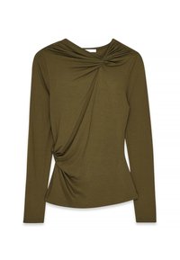 Olīvzaļš krekls ar garām piedurknēm, kuram ir pagriezta priekšpuse un mīksta tekstūra. Formu izceļoša silueta ar noapaļotu apakšmalu un sakārtotu dekoltē.