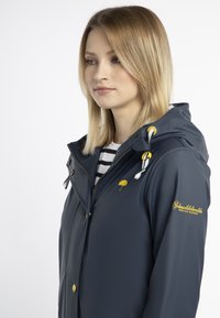Schmuddelwedda INCUS - Impermeable - marine hellgrau melange