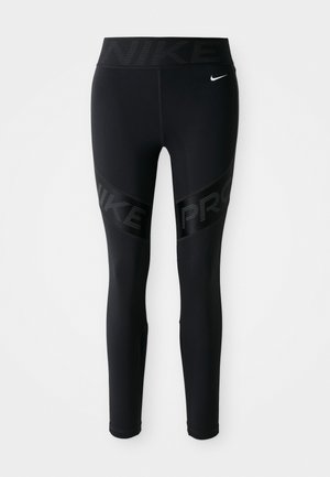 Black Nike Pro leggings with high waistband featuring "NIKE" text and a small white Nike swoosh logo on the left hip.
