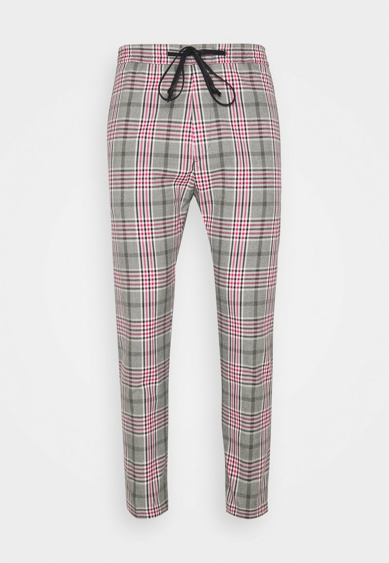 Pantalon fuselé à carreaux gris et roses avec une ceinture à cordon noir, présenté à plat sur un fond blanc.