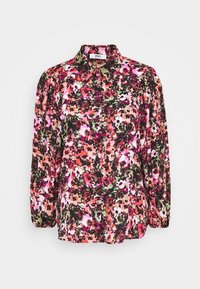 Blouse florale colorée dans des teintes de rose, vert et noir. Présente des manches longues, un col et une coupe décontractée avec une texture légèrement transparente.