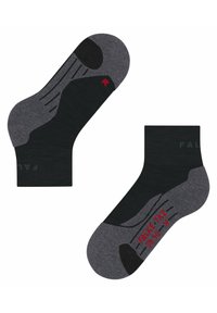 Chaussettes de cheville noires et grises avec un orteil renforcé, des lignes de grip texturées et le logo FALKE en turquoise et rouge sur le revers et la semelle.