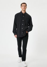 Koton BRAD - Vaqueros slim fit - black