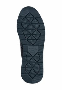 Suola di scarpa in gomma nera con un motivo a treccia geometrico che presenta esagoni e triangoli per la trazione; bordi lisci e logo impresso visibile.