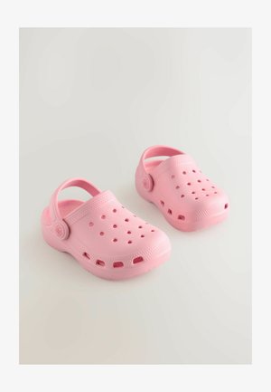 Rosa Plastik-Clogs mit Belüftungslöchern, Riemen hinten, glatter Textur und abgerundetem Zehendesign. Flexible und leichte Bauweise.