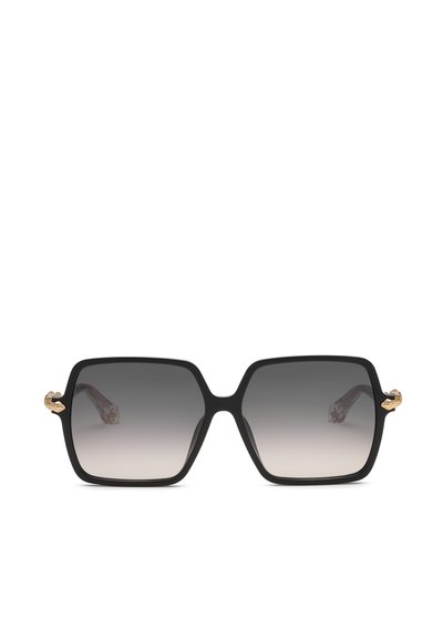 Lunettes de soleil carrées noires oversize avec verres dégradés foncés et petits accents dorés en forme de serpent sur les branches.