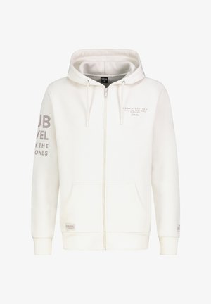 Witte zip-up hoodie gemaakt van zachte stof, met twee voorklassen, trekkoorden op de capuchon en bedrukte tekst op de mouwen.