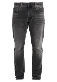 Grå denimjeans i slim fit med en standard femficksdesign, knappstängning och en subtilt blekt textur.