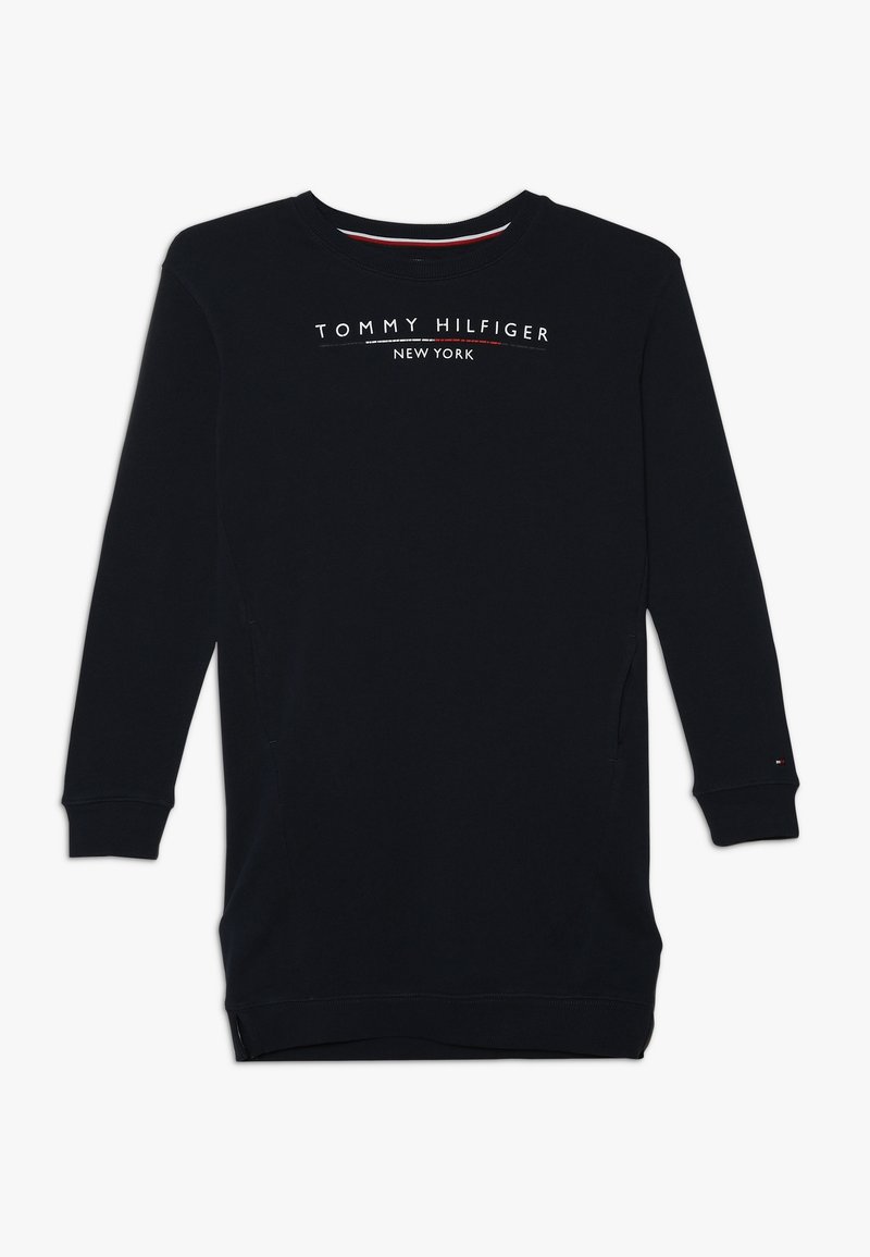 Granatowa bluza z długim rękawem i okrągłym dekoltem, z białym logo "TOMMY HILFIGER NEW YORK". Posiada boczne kieszenie i ściągacze przy mankietach.