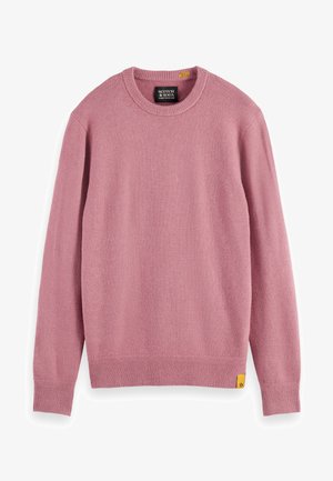 Rosa Pullover aus weichem Strickstoff. Rundhalsausschnitt, lange Ärmel, gerippte Bündchen und Saum, mit einem kleinen gelben Logolabel an der unteren Seite.