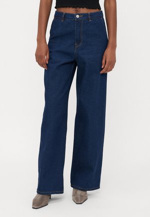 Bredde ben jeans i blå denim med høy midje, med gule sømmer og knappelukking. Glatt tekstur med en klassisk design.