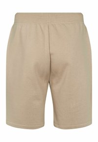 Bežové bavlnené šortky s elastickým pásom, rovný strih, dĺžka po stred stehien, hladká textúra a žiadne viditeľné vrecká ani ozdoby.