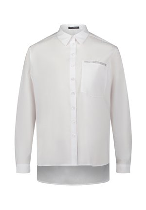 Chemise blanche à manches longues, boutonnée, en tissu lisse et léger. Dotée d'une poche avec ornement et d'un col classique.