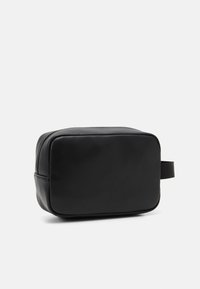 Tommy Hilfiger FOUNDATION WASHBAG UNISEX - Toilettas - black