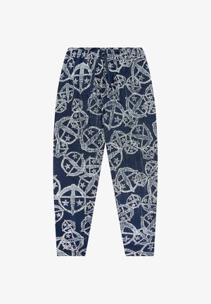 Tummansinisiä housuja, joissa on valkoinen graafinen kuvio, jossa on tähtiä ja pyöreitä muotoja. Joustava vyötärö vyönauhakiristimellä säädettävää istuvuutta varten.