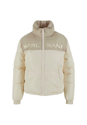 Bunda typu puffer v krémovej farbe s béžovými akcentmi. Vysoký golier, predné zapínanie na zips a vyšívané logo "KARL KANI" na hrudi. Štruktúrovaná látka.