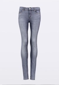 Lieknos šviesiai mėlynos spalvos džinsinės kelnės, su išblukusiu efektu. Turi aukštą liemenį, penkių kišenių dizainą ir sidabrinę užsegimo aparatūrą.