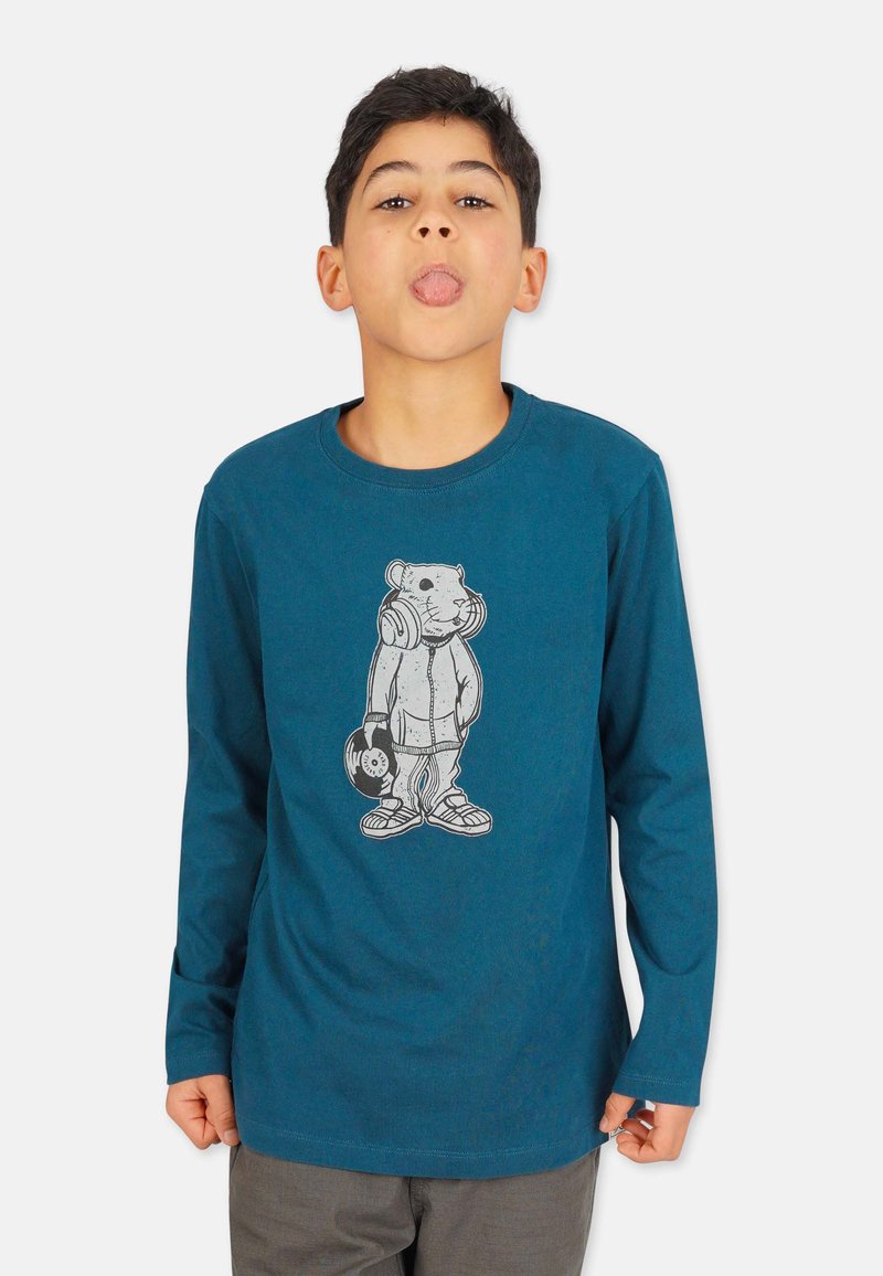 Teal long-sleeve t-shirt with a graphic of a bear lifting weights, round neckline, and soft texture. Worn with gray pants.