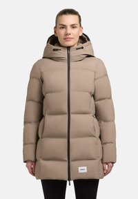 Beige puffer coat with a hood, featuring a front zipper, side pockets, and a brand label at the hem. Insulated design and quilted texture.