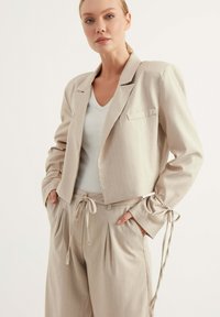 Chiquelle Tygbyxor - beige