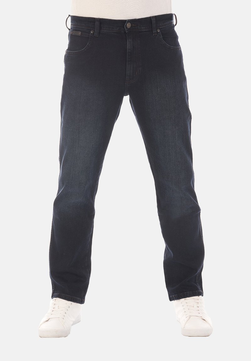 Jeans de mezclilla azul oscuro con corte recto, cinco bolsillos y cierre de botón. Presentan un leve desgaste y costuras en contraste.