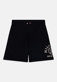 Pantalones cortos de algodón negros con una cinturilla elástica y cordón. Presenta un logo en color crema impreso en el lado izquierdo. Diseño simple, corte recto.