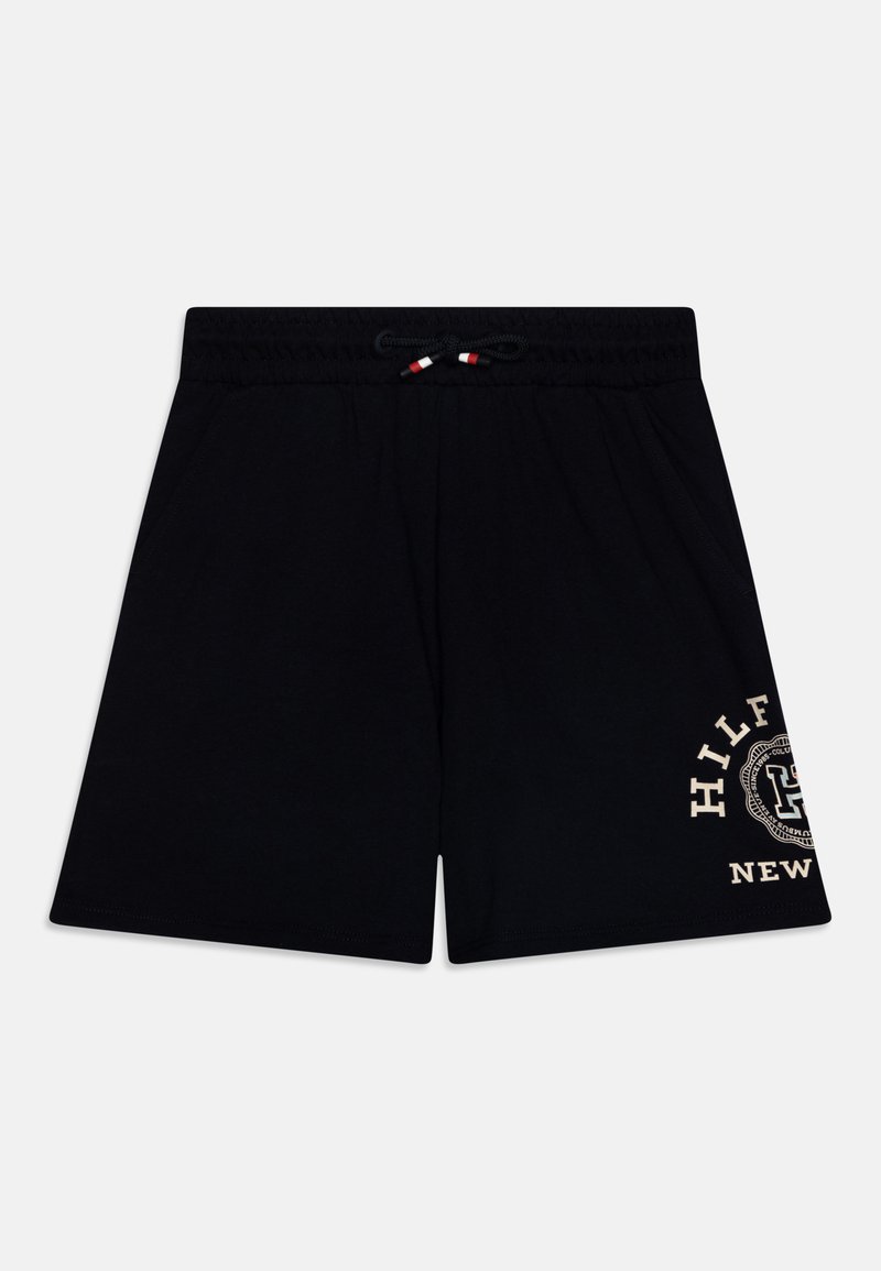 Pantalones cortos de algodón negros con una cinturilla elástica y cordón. Presenta un logo en color crema impreso en el lado izquierdo. Diseño simple, corte recto.
