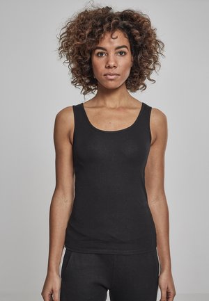 Schwarzes Tanktop aus Baumwollmischung mit Rundhalsausschnitt und schlichtem Design. Weiche Textur mit körpernahem Schnitt.